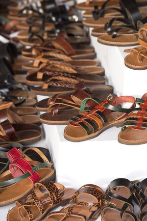 Leather slippers on a marketの写真素材