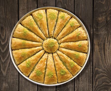 Turkish baklava on grunge wooden backgroundの写真素材
