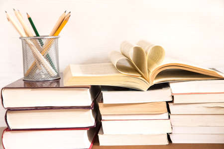 Pile of books and the pencilsの写真素材