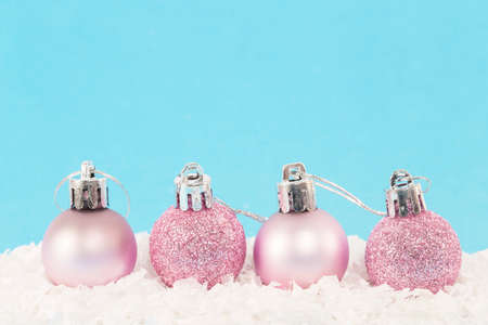Christmas balls on white and blue backgroundの写真素材