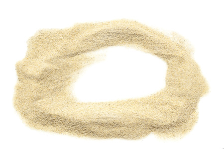 Sand heap on white backgroundの写真素材