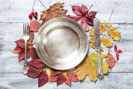 Fall table setting on white wooden backgroundの写真素材