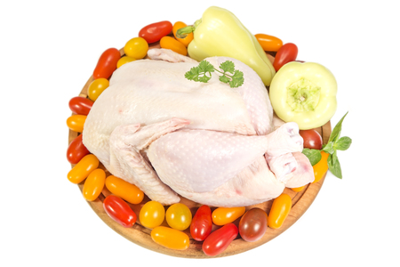 Raw chicken with the fresh vegetablesの写真素材