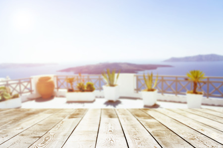 Empty wooden board on a Mediterranean terraceの写真素材