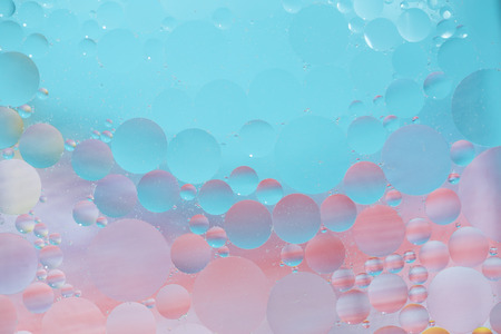 Oil drops in water -  colorful abstract backgroundの写真素材