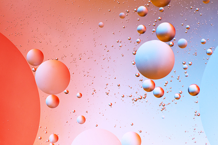 Oil drops in water - a colorful abstract background