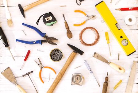 Tools collection on white wooden backgroundの写真素材