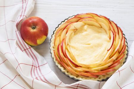 Preparing apple pie on white wooden backgrundの写真素材