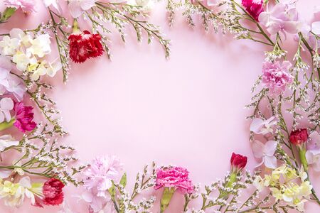 Floral arrangement on pink backgroundの写真素材