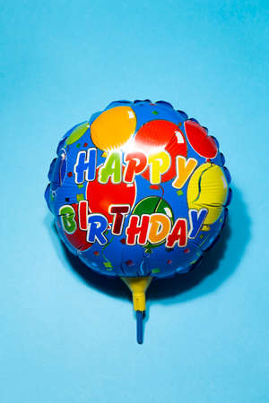 Birthday balloon on blue background