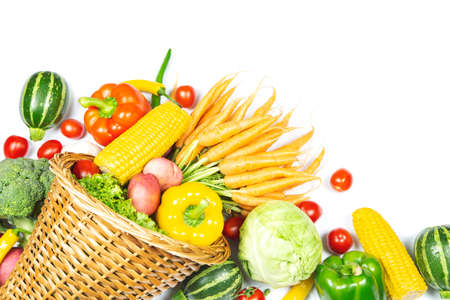 Fresh vegetables with Horn of Plenty on white background