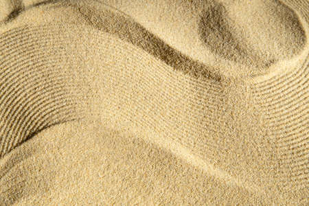 Zen pattern in brown sandの写真素材