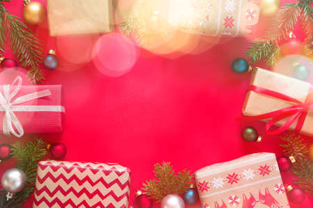 Christmas and New Year presents on red backgroundの写真素材