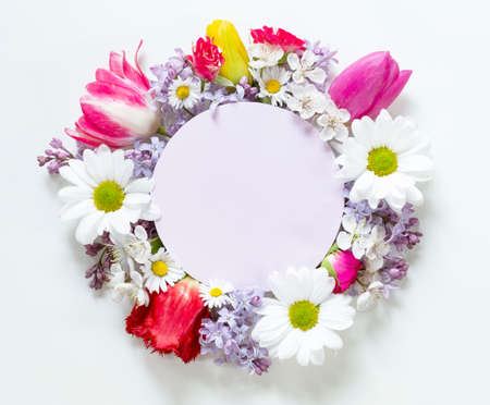Spring flower composition with a blanck noteの写真素材
