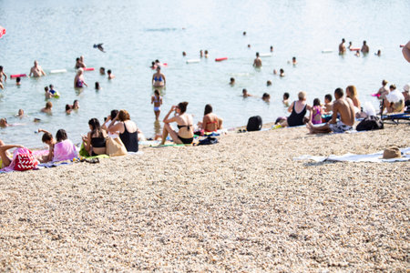 People sunbathing on a beachの写真素材