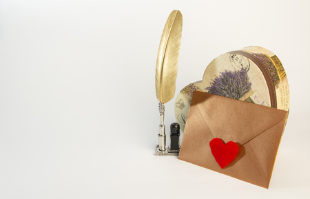 Love letter for valentine, romantic setup with an envelope with sweet words for a loved one, white backgroundの写真素材