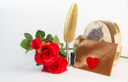 Love letter for valentine, romantic setup with an envelope with sweet words for a loved one, white backgroundの写真素材