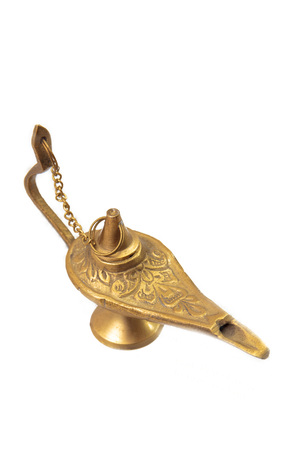 Golden magic lamp, Aladdins genie lantern, on a white backgroundの写真素材