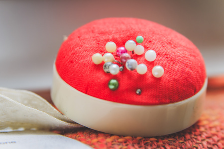 Pins and needles in a pin sponge, tailor accessoriesの写真素材