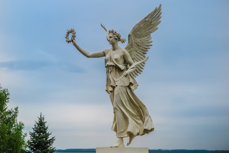 MAY 2015, PETERHOF PALACE - SAINT PETERSBURG, RUSSIA: Peterhof Palace, famous monumental building with water streams and large golden statues around itのeditorial素材