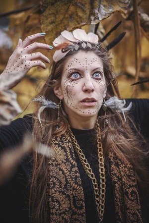Shaman indian, native american, woman casting spells in natureの写真素材