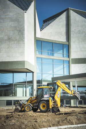 OCTOBER 2017, BELGRADE SERBIA: Renovation of Museum of Modern Art in Belgrade, earth diggers, bulldozers and construction workers working tirelessly on a sunny dayのeditorial素材