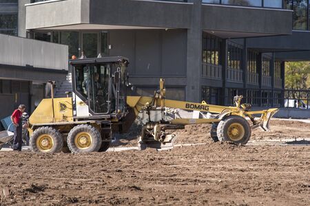 OCTOBER 2017, BELGRADE SERBIA: Renovation of Museum of Modern Art in Belgrade, earth diggers, bulldozers and construction workers working tirelessly on a sunny dayのeditorial素材