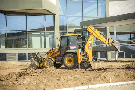 OCTOBER 2017, BELGRADE SERBIA: Renovation of Museum of Modern Art in Belgrade, earth diggers, bulldozers and construction workers working tirelessly on a sunny dayのeditorial素材