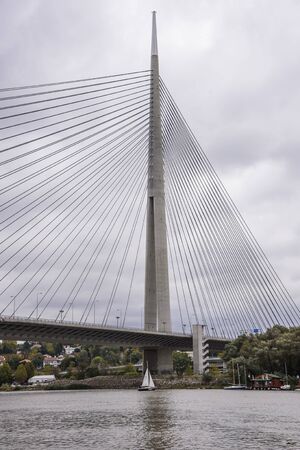 OCTOBER 2017, BELGRADE SERBIA: Bridge over Ada - Most na Adi -, contemporary bridge over Sava river as viewed from a boatのeditorial素材