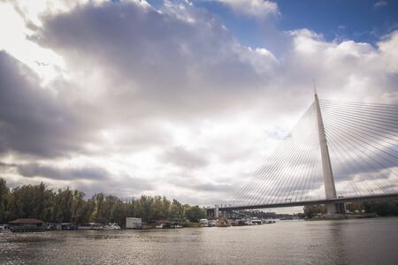 OCTOBER 2017, BELGRADE SERBIA: Bridge over Ada - Most na Adi -, contemporary bridge over Sava river as viewed from a boatのeditorial素材