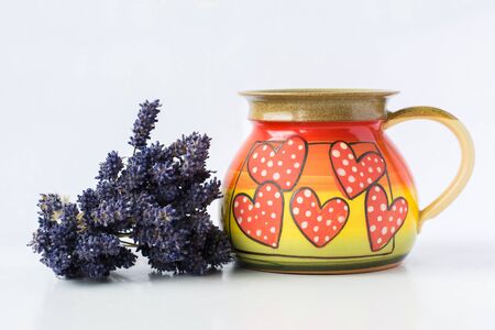 The dried lavender in color clay cupの写真素材