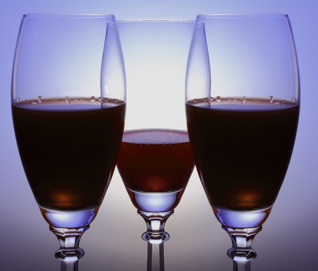 three glasses on the colored backgroundの写真素材