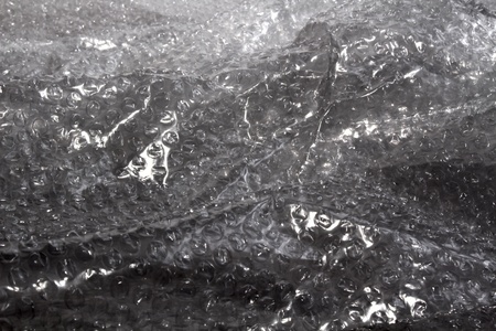 a cellophane texture as water in the rainの写真素材