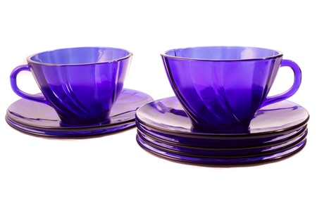 two blue cups with saucers on the white backgroundの写真素材