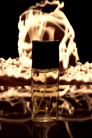 a bottle of aroma on the fire backgroundの写真素材
