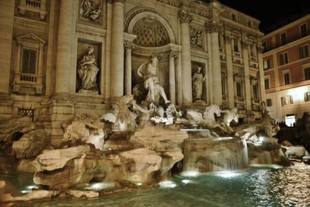 Trevi Fountain Rome at night with touristsのeditorial素材