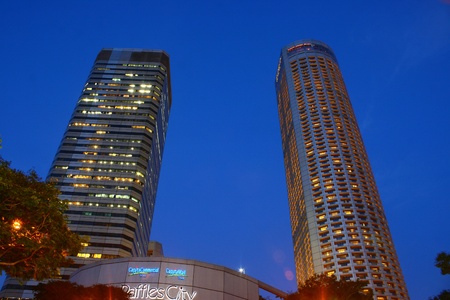 Asia Skyscraper, Raffles City, Evening night City Singapore のeditorial素材