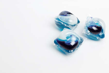 Washing capsules in the washing machine. Gel and conditioner in water-degradable form. Cleans and...