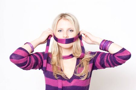 Portrait of a beautiful woman wearing fashion clothingの写真素材