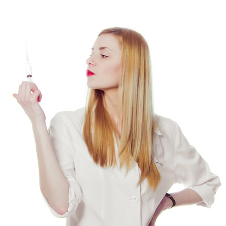 pretty nurse with syringeの写真素材