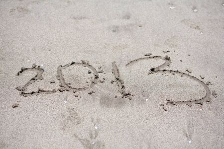 New year background of beach with  2013  drawn in the sand の写真素材