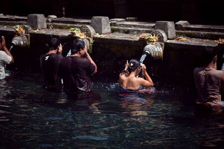 holy spring water in tirta empul, bali, indonesiaのeditorial素材
