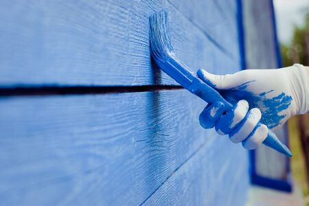 hand painting blue wooden wall の写真素材