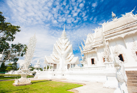 Famous Thailand temple or grand white church Call Wat Rong Khun, at Chiang Rai province, northern Thailandの写真素材