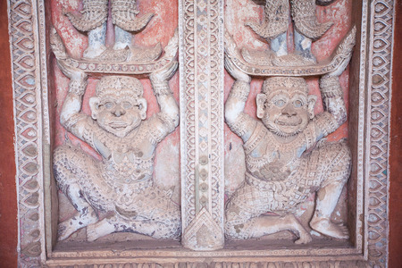 Buddhist temple door decoration in the capital of Vientiane, Laosの写真素材