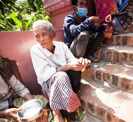 Dirty homeless people in Phnom Penh, Cambodia