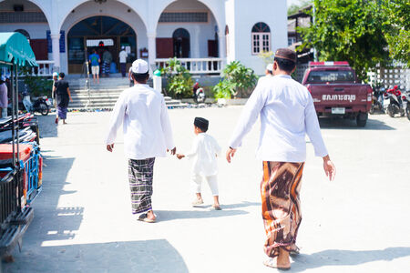 3 JAN 2014  THAILAND, Koh Samui. People in Muslim fisherman village, Samui island, Thailand 3 of...
