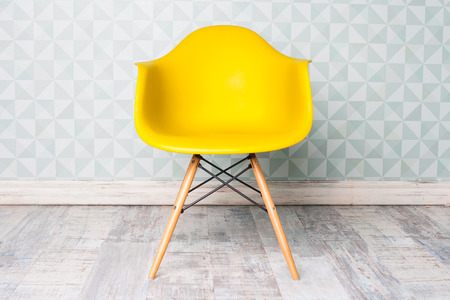 modern yellow chair in roomの写真素材