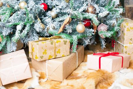 Presents under the Decorated Christmas tree. Happy new year!の写真素材