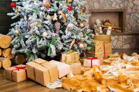 Presents under the Decorated Christmas tree. Happy new year!の写真素材